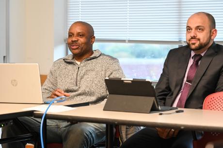 Two students interacting in a classroom